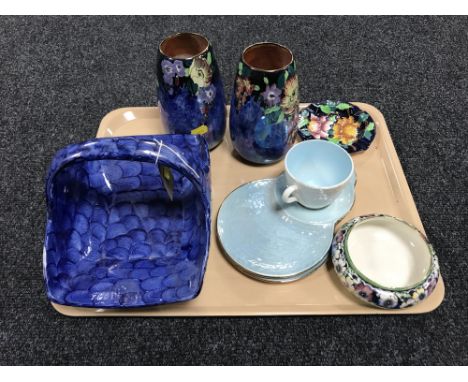 A tray containing Maling ware, including a lustre tea cup with two saucers, a Maling ash tray and powder bowl, Maling basket,