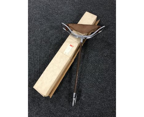 A boxed shooting stick