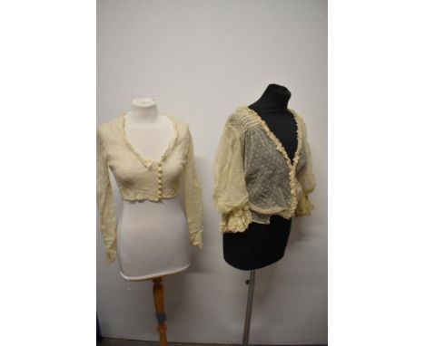 A late Victorian/ Edwardian tulle lace bodice having extensive ruffled lace cuffs and a similar lace blouse or bolero, around