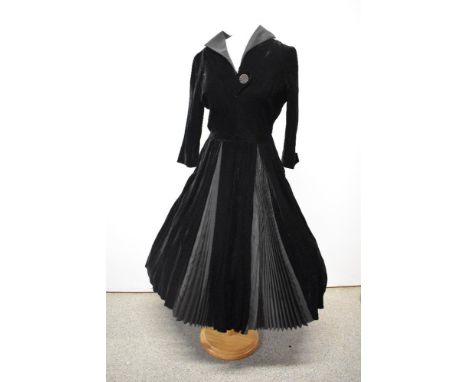 A late 1940s black velvet Elmoor of London dress, having contrasting taffeta concertina pleats to skirt, taffeta collar with 