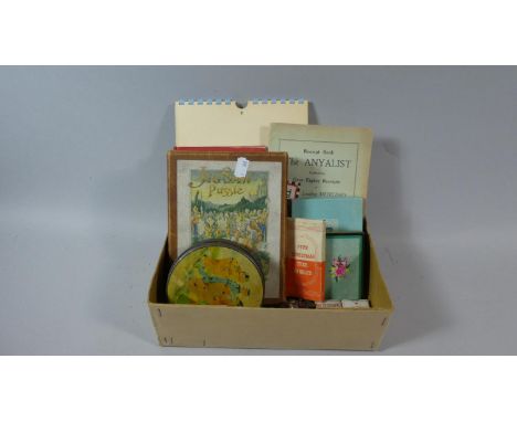 A Box of Printed Ephemera to Include 1950's Risque Calendar, Wooden Jigsaw Puzzle, Vintage Tin, Playing Cards etc 