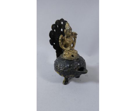 A Cast Hindu Altar Offering Vessel with Original Gilt Coloration Set on Three Claw Feet with Hindu Deity (Possibly Shiva) Fin