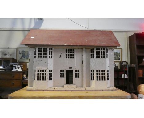 A Vintage Dolls House with Some Furniture, 71cm Long 