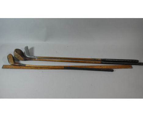 A Haberdashers Yard Rule Together with Two Vintage Golf Club Woods and a Putter 