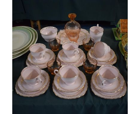 A Collection of Pink Vogue Teawares to Comprise Six Trios, Cake Plate, Sugar and Cream Together with Glass Decanter Set 