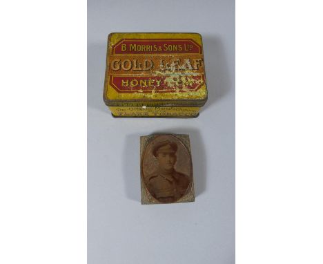 A Vintage Gold Leaf Tobacco Tin Containing Engraved Copper Print Block Depicting WWI Soldier Together with Dog Tag 