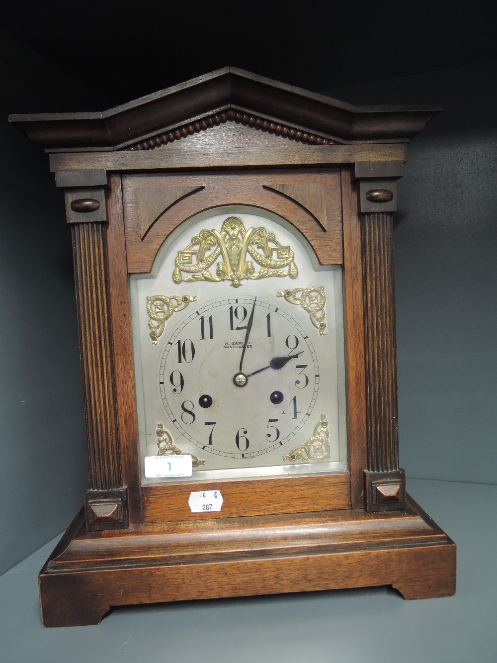 A gothic design mantle clock by H Samuel Manchester made in Wurtenburg