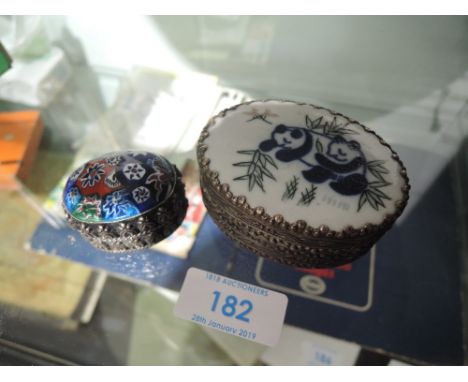 Two trinket of jewellery containers with enamel decorated tops