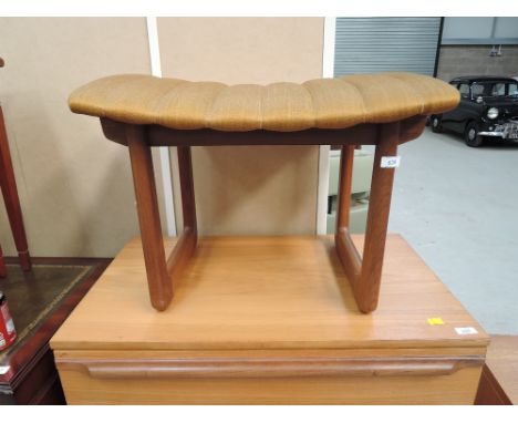 A vintage teak dressing table stool