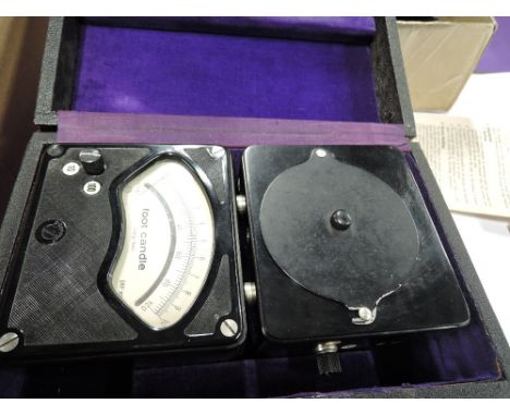 A Tavolux light meter in original hard case with instructions