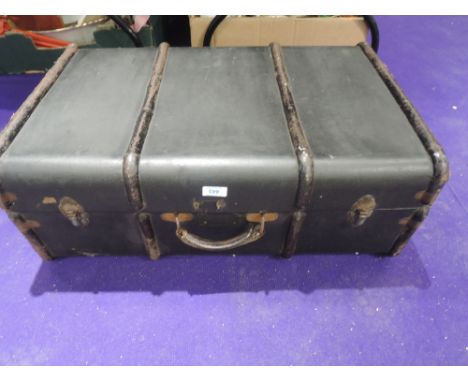 A vintage travel trunk or suitcase