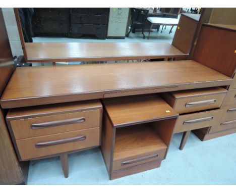A vintage teak G plan dressing table and bedside unit