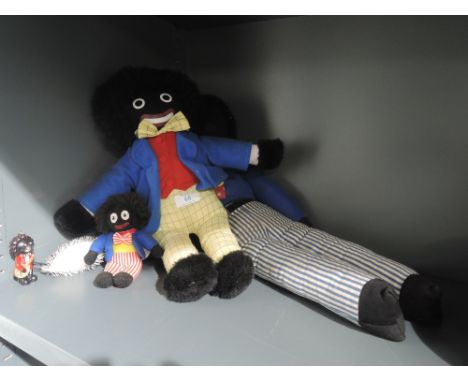 A selection of vintage golly dolls including shudehill and embrace