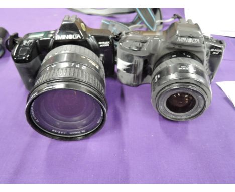 Two Minolta cameras. A Dynax 300di and a Dynax 3xi