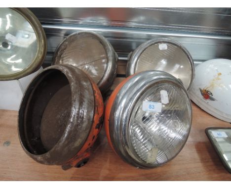 Two sets of car of motor engine head lights including Lucas`