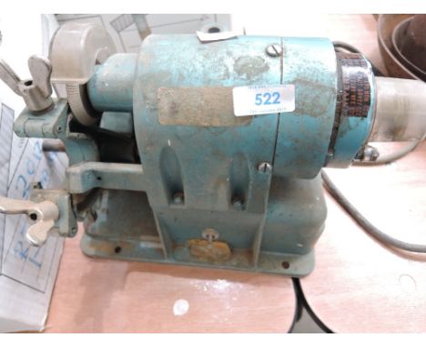 A vintage bench grinder (Universal)