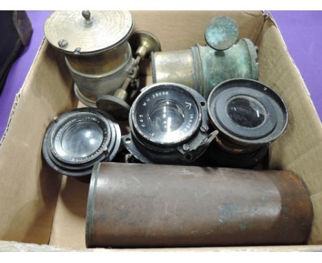 Eight vintage lenses including brass and copper bodied