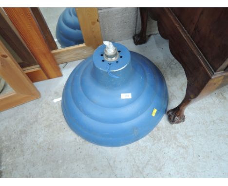 A vintage industrial ceiling light fitting