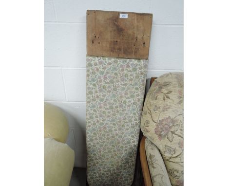 A vintage wood frame ironing board 