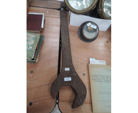 A very large heavy cast spanner 
