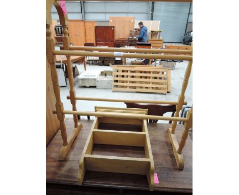 A traditional beech towel rail and wall shelf