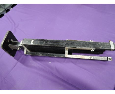 A vintage wooden Gandolfi tripod