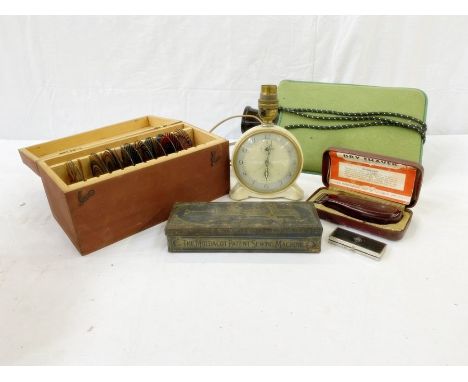 Rothemel Ltd hot water bottle, Smiths English Clocks Ltd table lamp clock, Viceroy razor (boxed), circular glass plates, a Mo