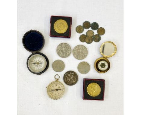 Metal pocket compass&nbsp;in velvet and leather case, another brass, another&nbsp;small black compass, a Toklon Ltd gilt mirr