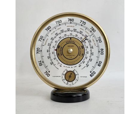 Mid 20th century Jaeger desk barometer, of circular form, with gilt metal frame, the dial with a centigrade thermometer, 18.2