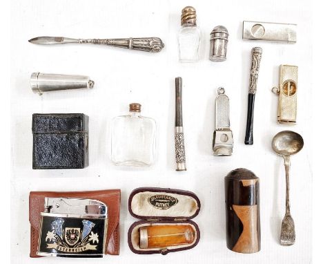 Silver-gilt cigar cutter, a silver salt spoon, a silver cigar cutter, a silver cheroot holder case&nbsp;with bakelite cheroot