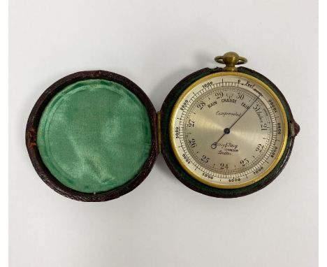 Army & Navy Stores Ltd  brass cased compensated pocket barometer, circa 1900, with silvered dial, in leather case, 4.8 cm dia