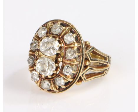 Diamond set ring, with two round cut diamonds to the dome head at 4.2mm diameter and a row of diamonds forming the surround, 