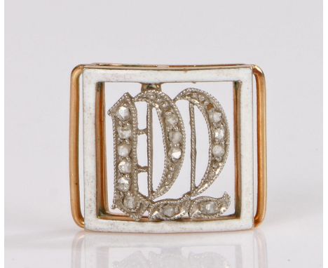 Edwardian diamond set clasp, the delicate clasp with diamond set initials DD and white enamel surround, 15mm diameter, 1.7 gr