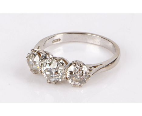 18 carat white gold and diamond ring, with three round cut diamonds to the head, the central diamond approximately 0.70 carat