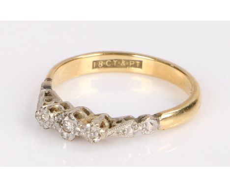 18 carat gold diamond set ring, with three diamonds to the head, 2.6 grams, ring size L