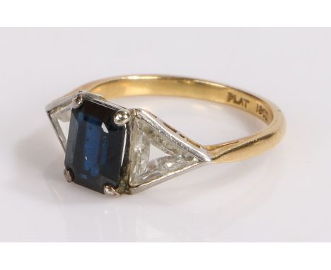 Art Deco 18 carat gold sapphire and diamond set ring, the central sapphire flanked to either side by trillion shape diamonds 