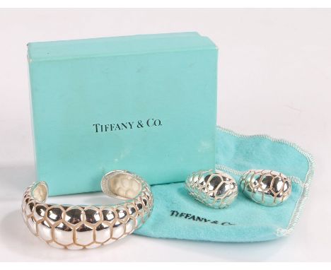 Silver Tiffany &amp; Co bangle with snake skin effect decoration , dated 1996, together with two earrings of the same year, g