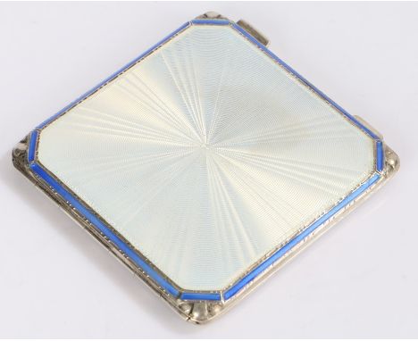George VI silver, blue and white enamel powder compact, with burst effect white enamel bordered in blue, the interior with mi
