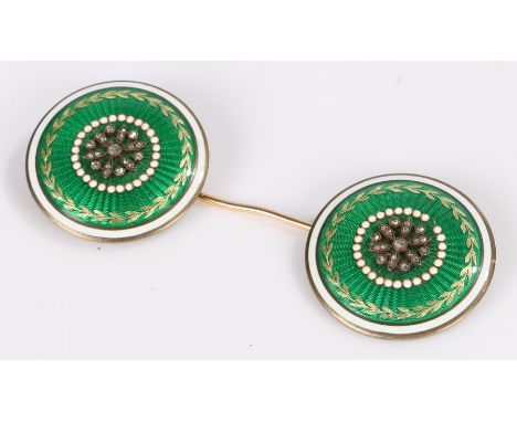 Early 20th Century diamond and enamel dual target brooch, the pin with a green guilloche enamel set with diamonds and enamel 