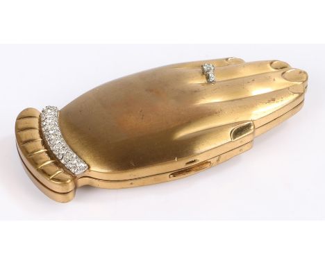 Volupte "Golden Gesture" powder compact, in the form of two hands, the left hand with paste set engagement ring and bracelet,