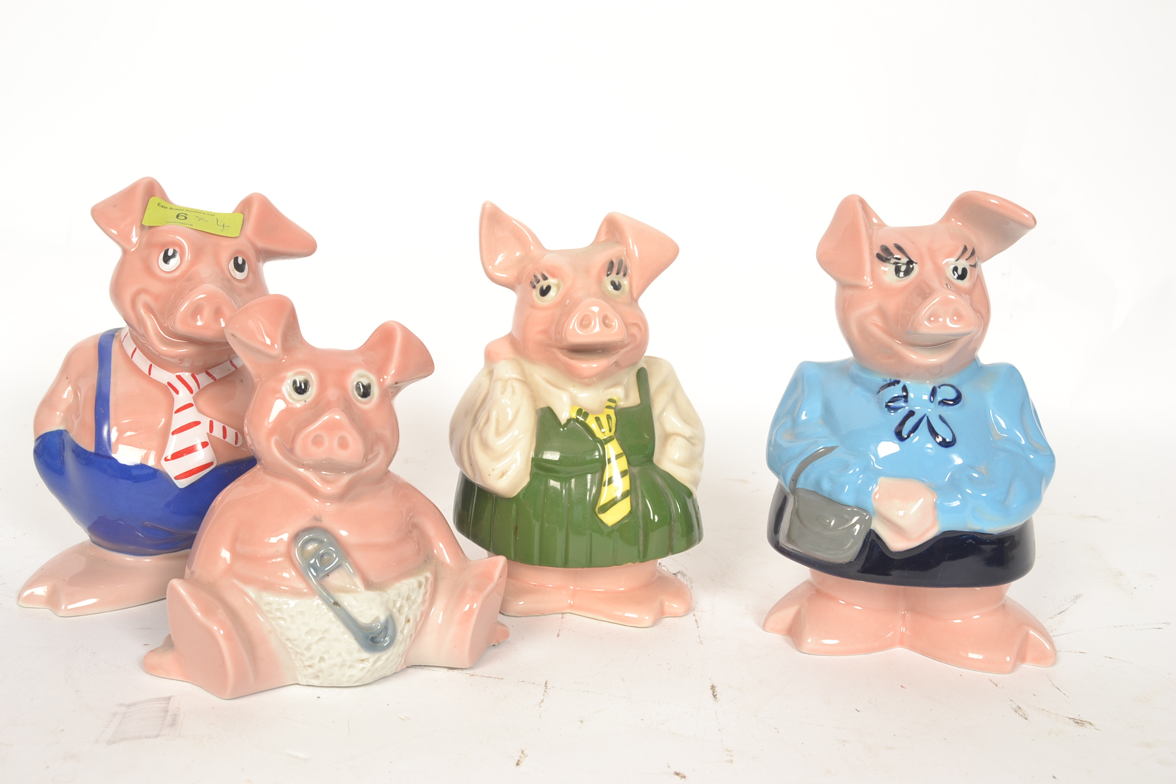 A collection of 4x Wade china Natwest piggy bank money box pigs. H19cm