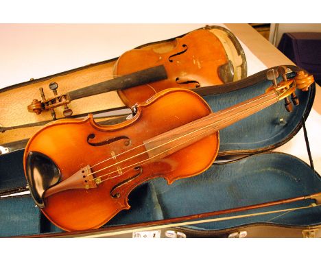 Violins, a pair (full size) in need of attention one in hard case, no strings, no bow, no markings the second in hard case in