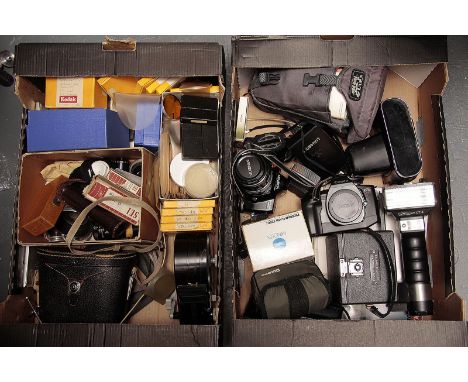 Cameras and Accessories,  Minolta, Canon and Zenith cameras with meters and a large quantity of filters and more (2 trays)