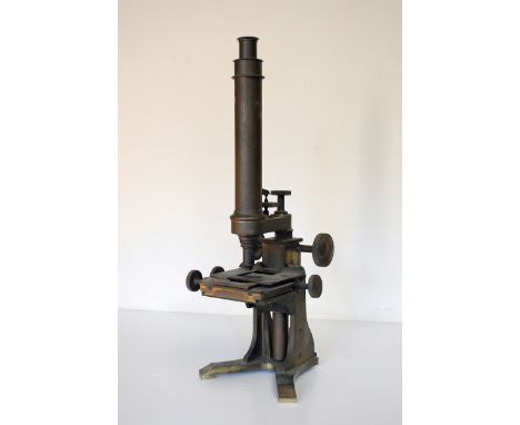 A Baker Brass Compound Microscope, with single objectiv and eyepiece