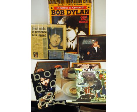 Bob Dylan, three stage photographs, framed and glazed, poster for Bournemouth concert May 2002, ticket stub with a framed and