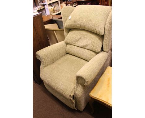 Sherborne electric reclining chair in light green fabric.