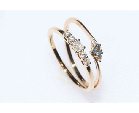 9k gold five stone diamond ring, and 9k gold aquamarine and zircon ring, sizes S, with certificates (2).