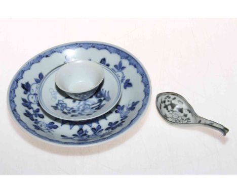 Tek Sing blue and white dish, 18.5cm diameter, tea bowl and saucer, and small ladle (4).