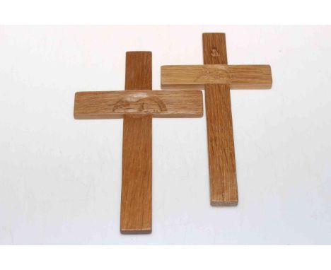 Two small oak crosses with Mouseman carving, largest 20.5cm by 13cm.