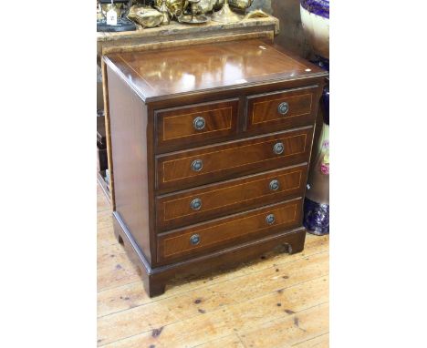 Mahogany and line inlaid chest of two short above three long drawers on bracket feet, 73cm high by 62cm wide by 40cm deep. (P